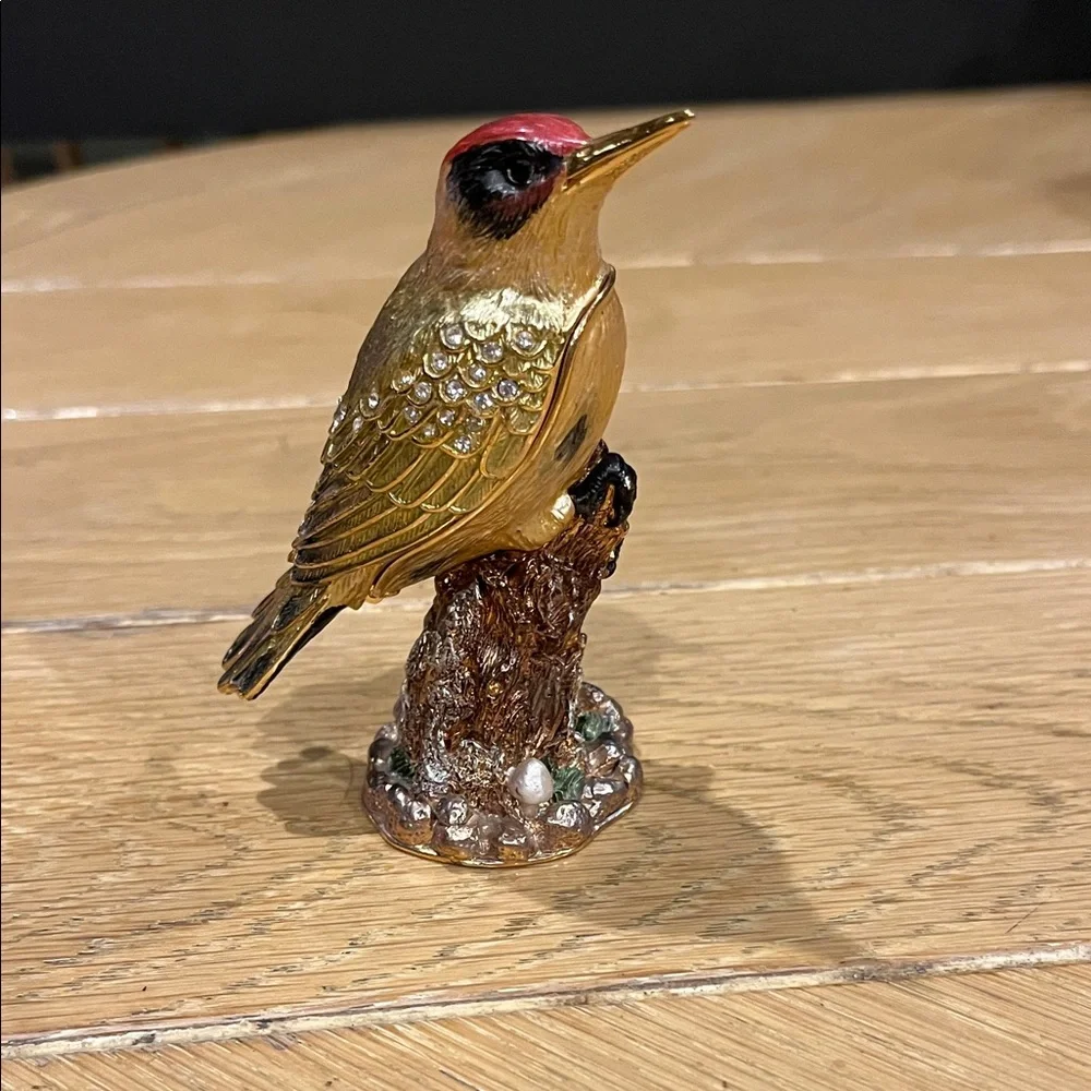 Elegant Gold and Red Bird Figurine